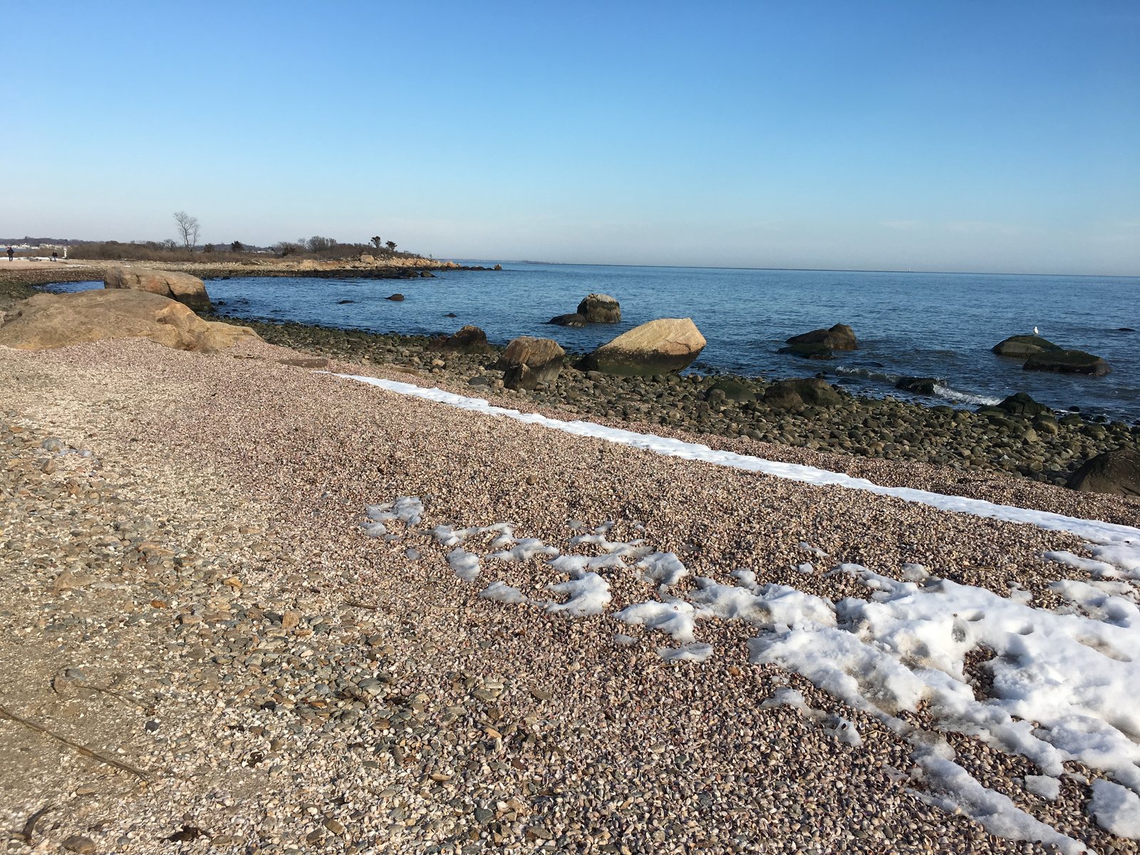 Rocky shoreline and water at Hammonasset Beach State Park in Madison, Connecticut